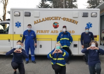 First Responders wearing face shields with holders produced by 3D printers at Centenary Stage Company.