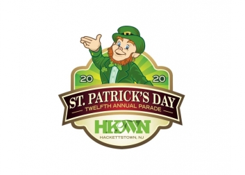 Leprechaun waving for Hackettstown's St. Patrick's Day parade